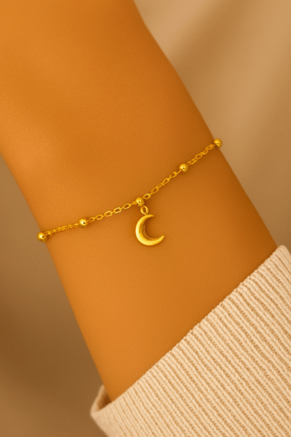 Bracelet lune original doré en acier inoxydable pour femme, porté au poignet