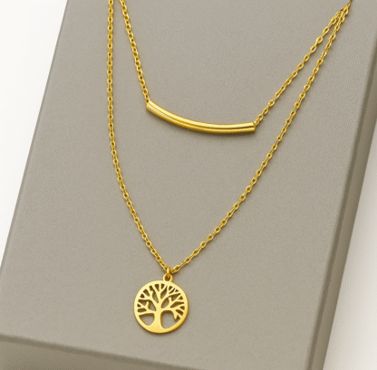 Collier doré avec pendentif arbre de vie et barre fine en acier inoxydable sur boîte grise