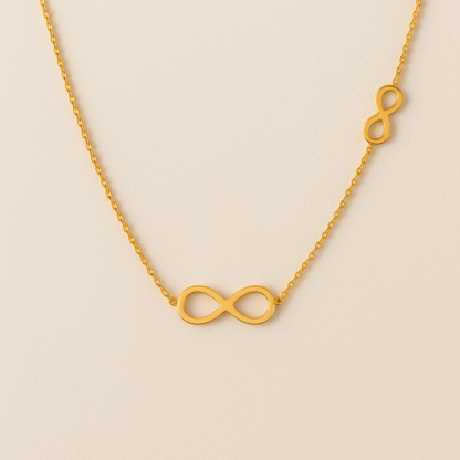 collier chaîne fine avec deux symboles infini pour
