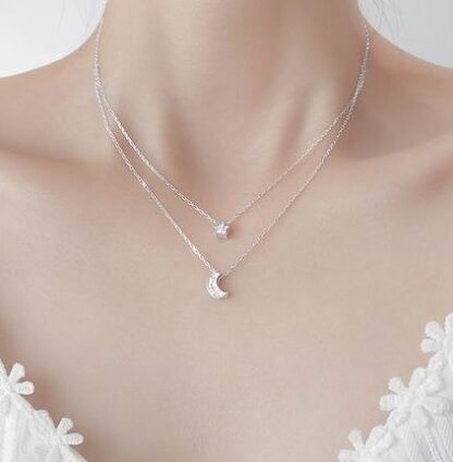 collier multirangs argent tendance 2024